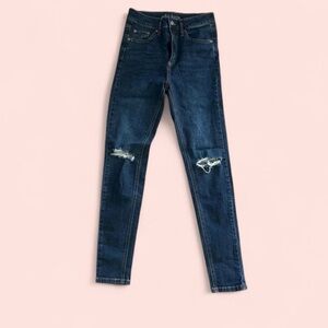 distressed dark wash skinny jeans